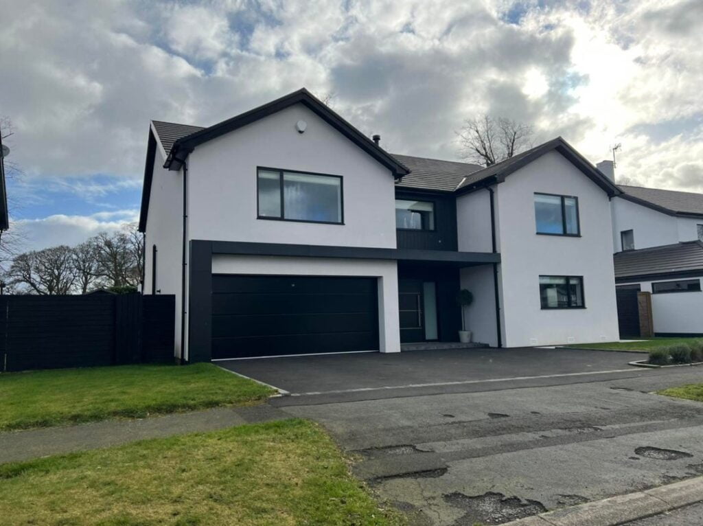 house with white silicone render