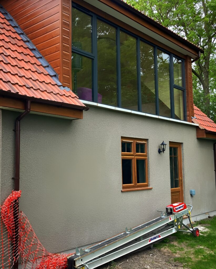 house with sand and cement render applied