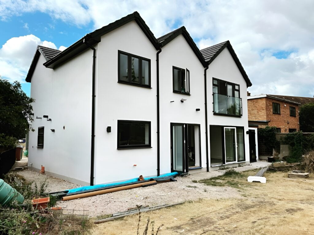 house with white silicone render