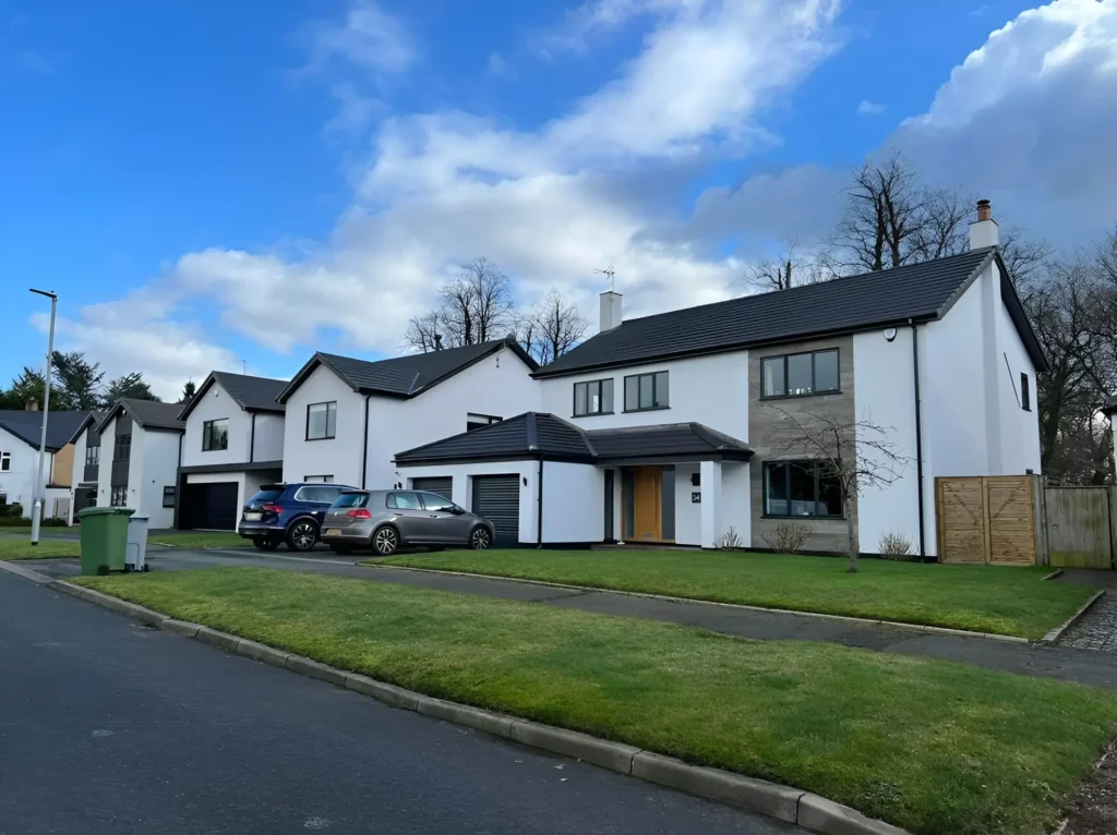 white silicone render applied on multiple houses