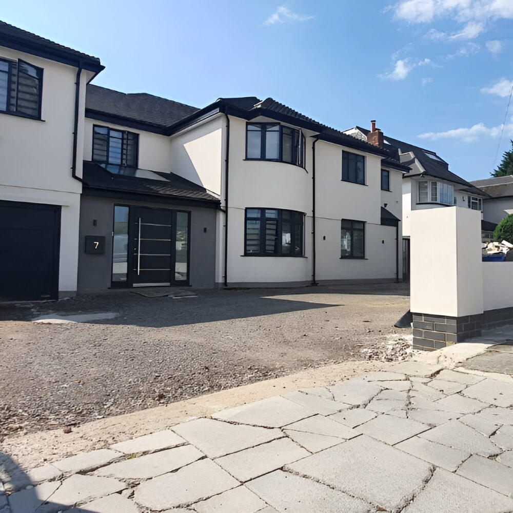 house with white silicone render