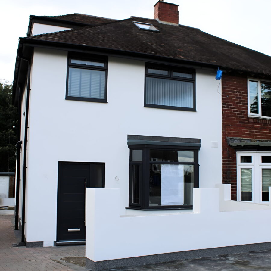 house with white silicone render